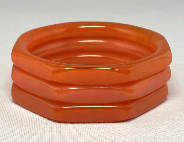 BB556 semi translucent orangle octagon bakelite bangles